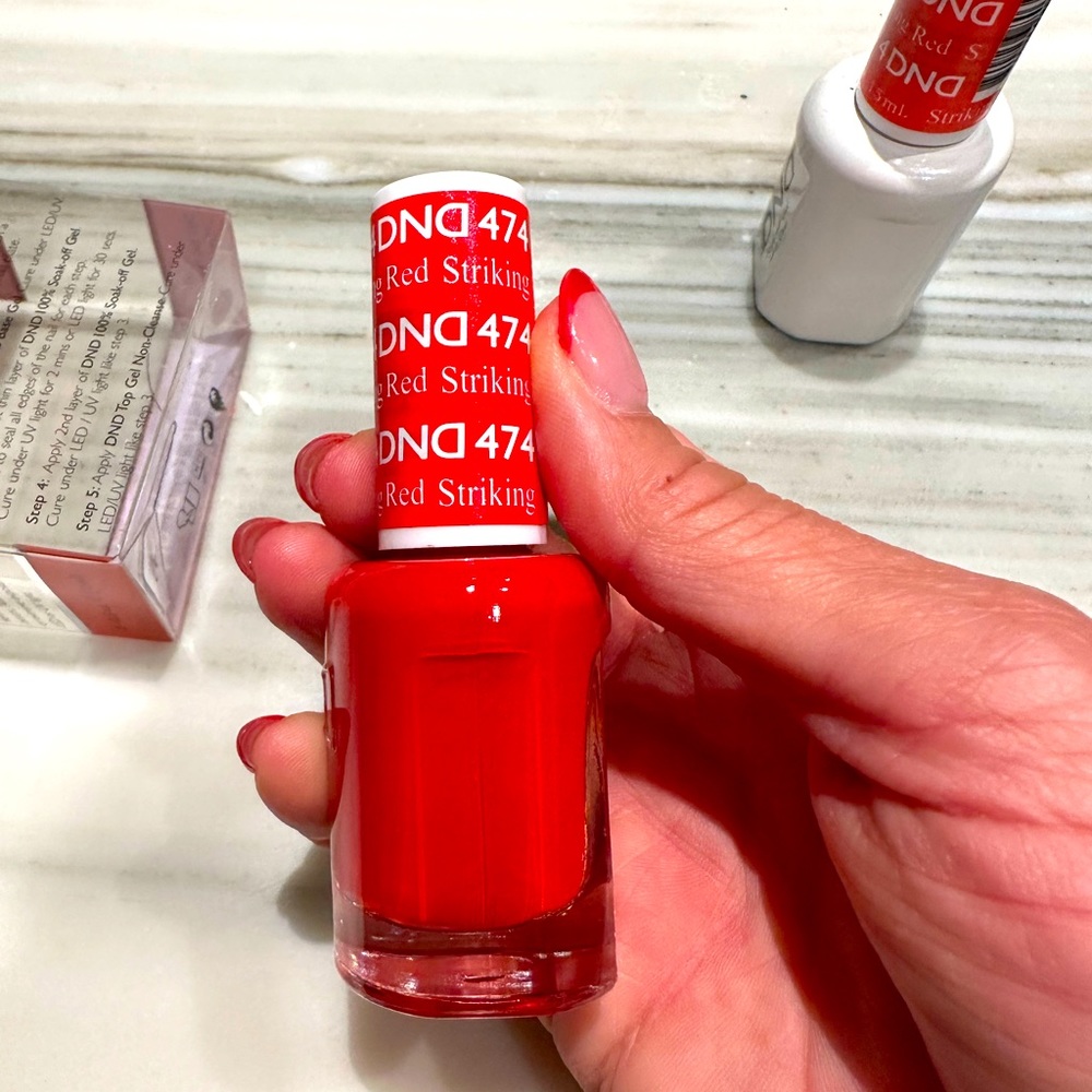 DND brand new and unused gel and polish combo. New with box. 474 striking red